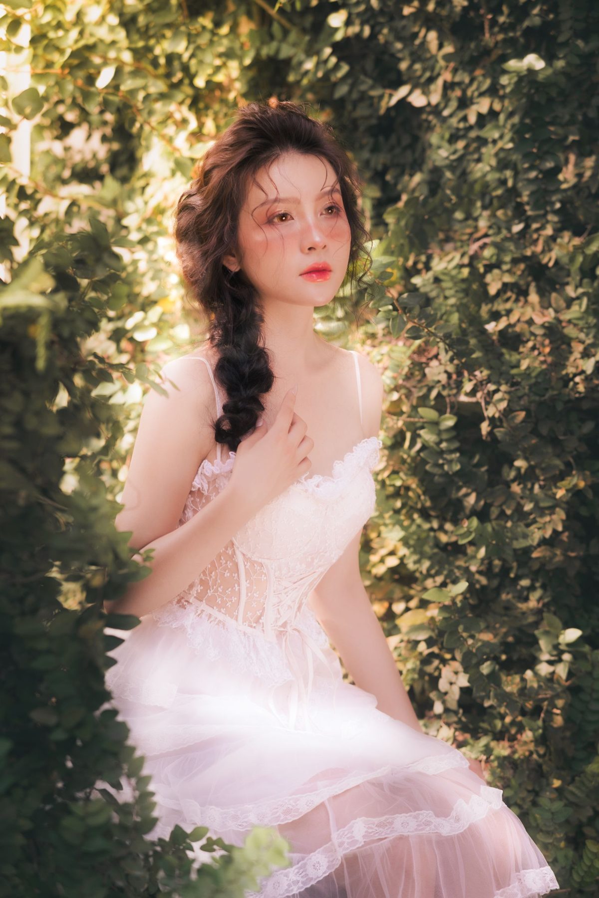 Boho garden bride in a lace gown with fresh natural luxurious makeup